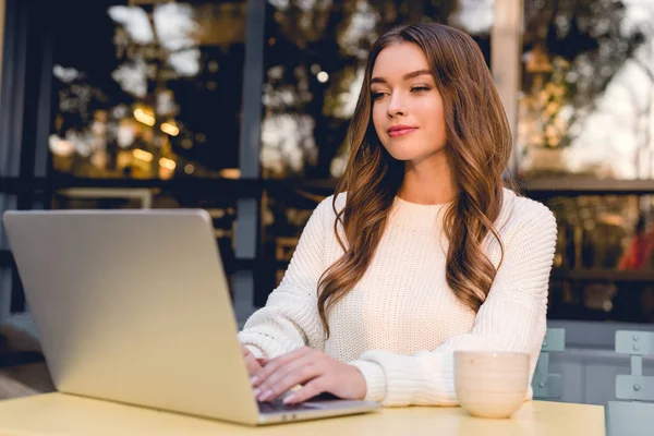 depositphotos_255322186-stock-photo-attractive-happy-freelancer-using-laptop