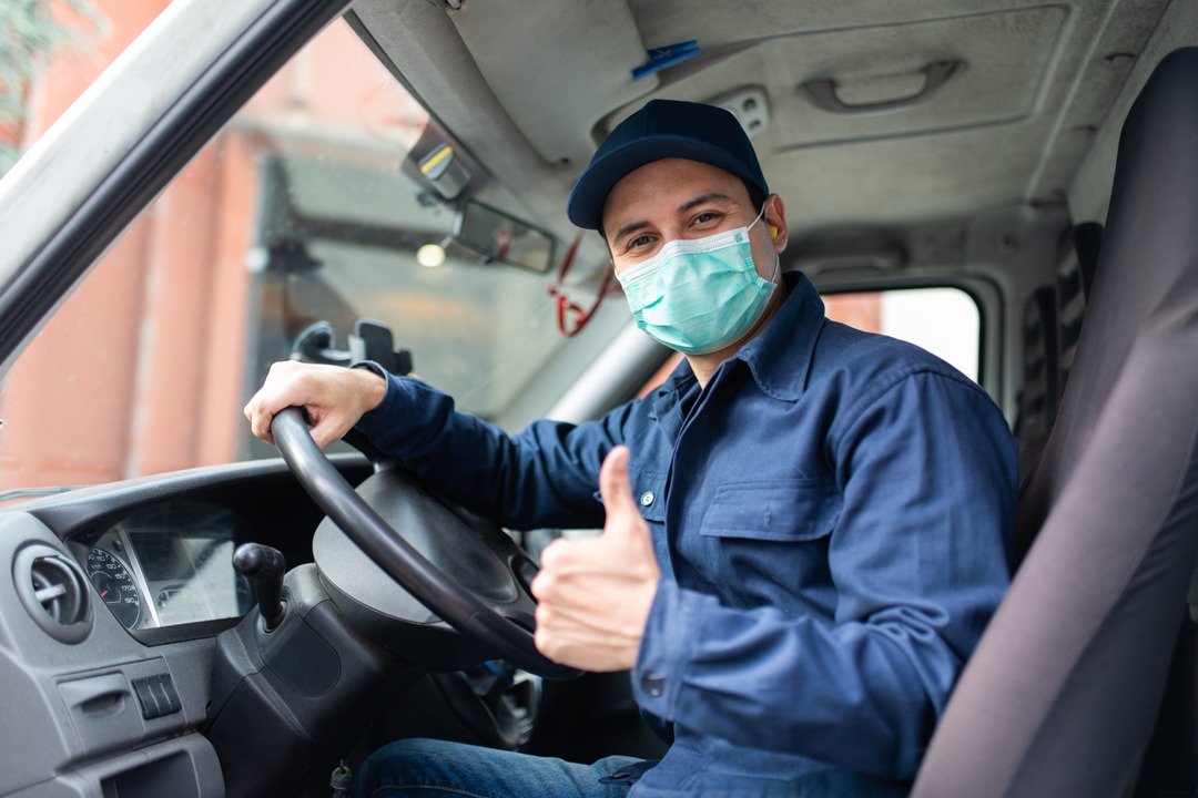 truck-driver-giving-thumbs-up-during-coronavirus-pandemic-1-1-scaled (1)